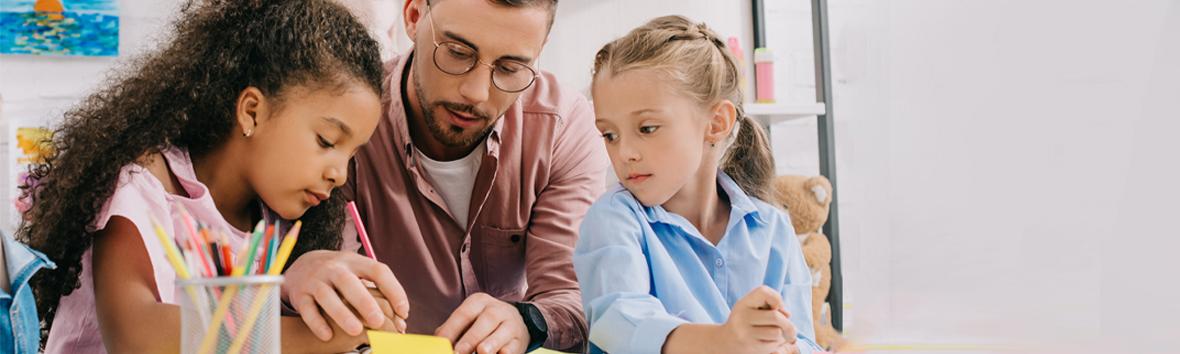 Clinician in the process of a SEL evaluation of two children