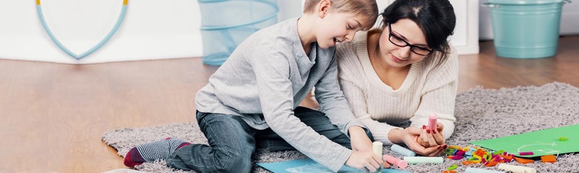 Clinician evaluating a child for symptoms of autism