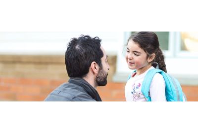 A Holistic Approach to Back-to-School Season - A father dropping his daughter off at preschool