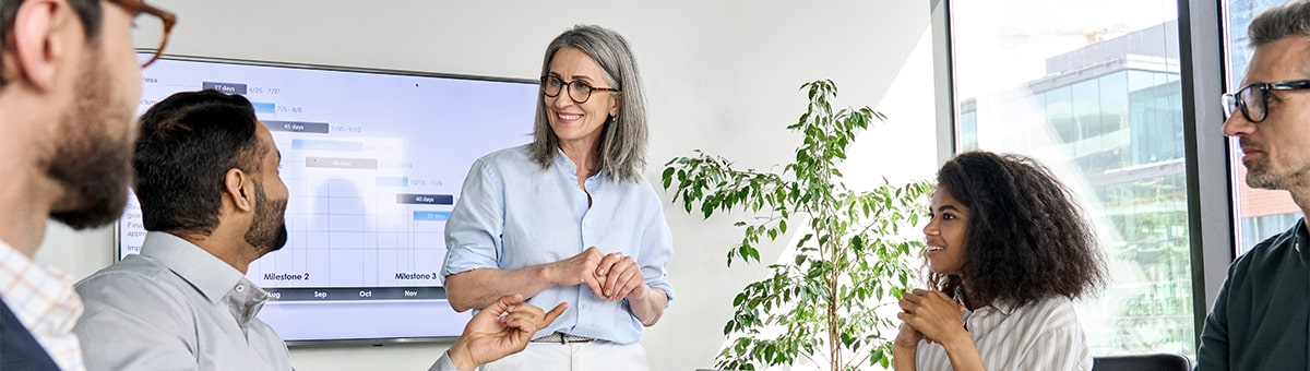 Director of curriculum and instruction discussing goals for the year with colleagues