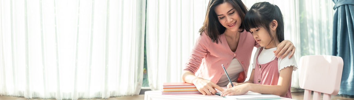  A young girl with dyslexia learning new skills to improve her reading.