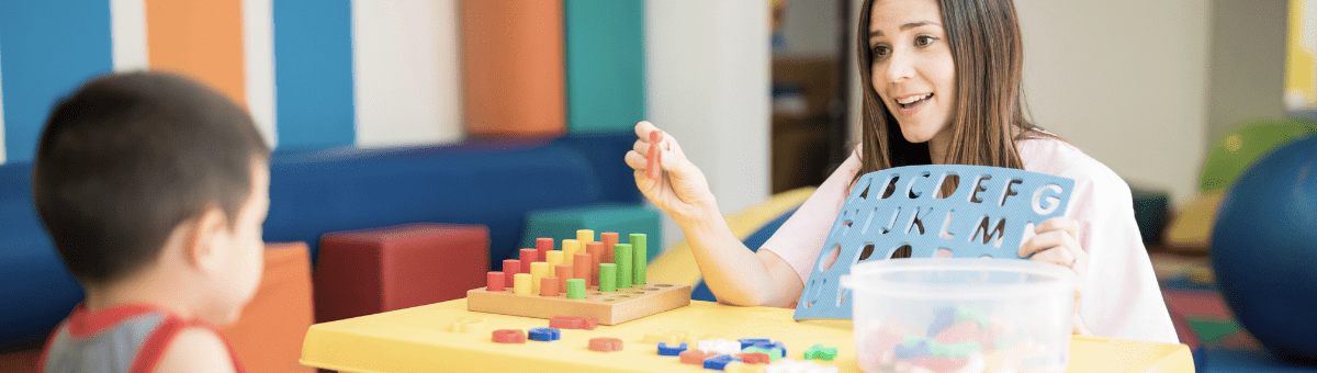 Speech–Language Pathology – Social Communication Disorder – children interacting in classroom settings and with parents.